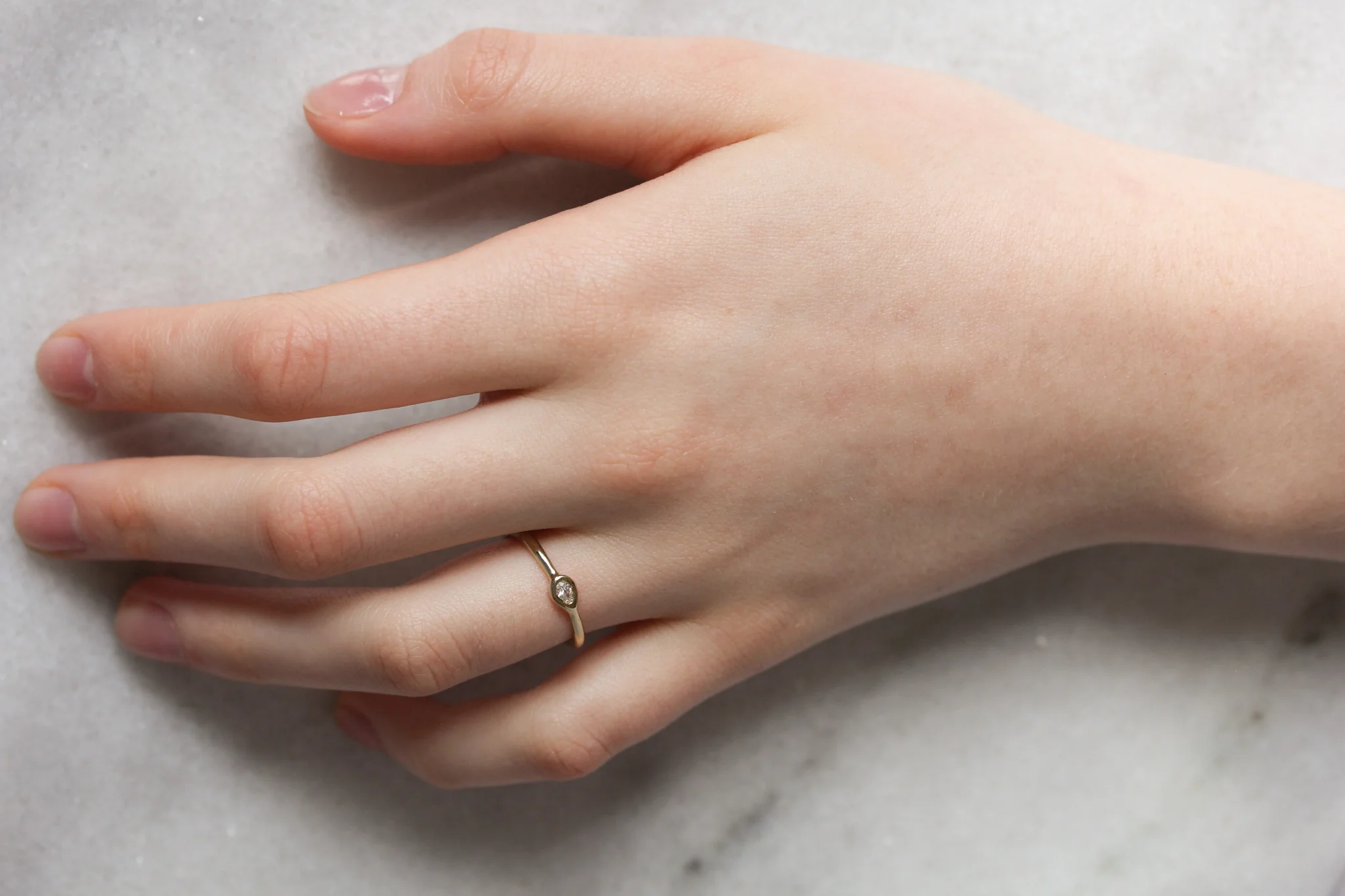 The Lyric Pear: A 14k Gold Hand-Carved Diamond Ring - Mitchell's Manufacturing Jewel