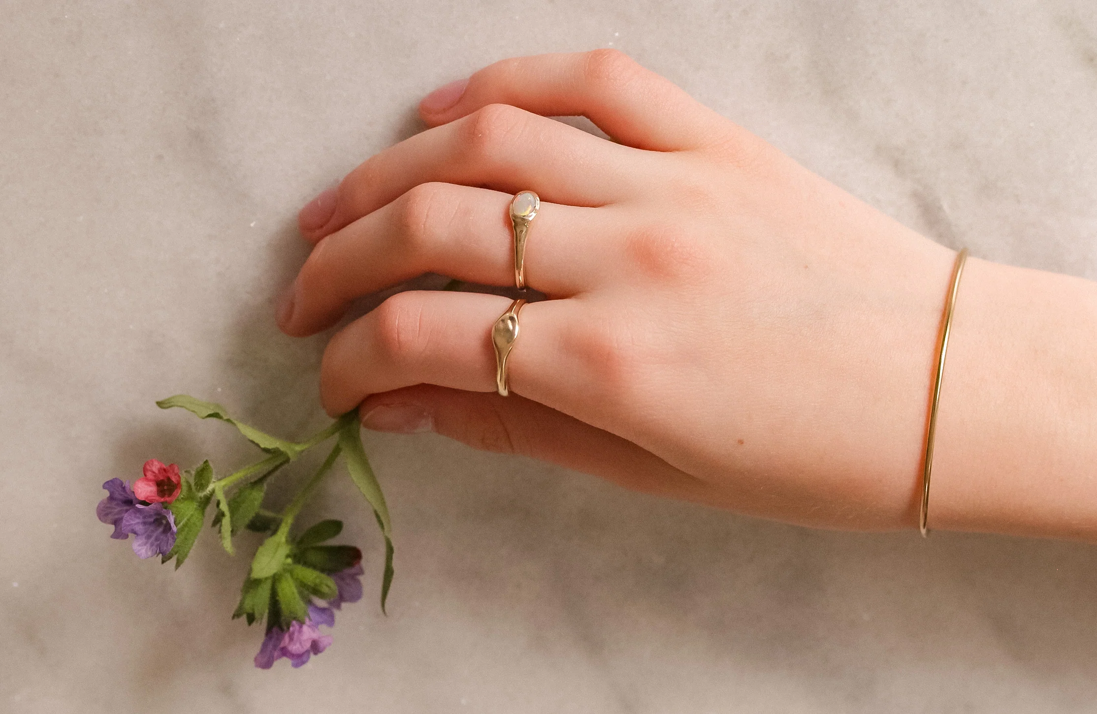 The Reverie Oval: A 14k Gold Hand-Carved Opal Ring - Mitchell's Manufacturing Jewel